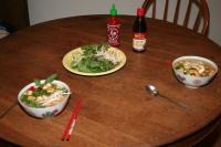 vegetarian pho for two, with garnishes and condiments