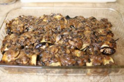 Tofu-stuffed eggplant with mushroom ragout in baking dish